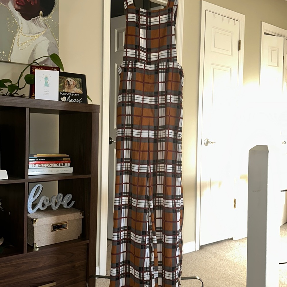 Brown, tan, black plaid overall style jumper